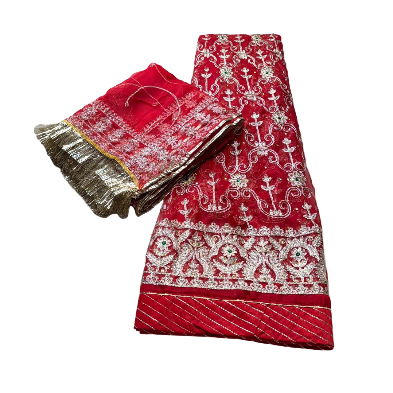 Red fabric with white embroidery on a light gray surface
