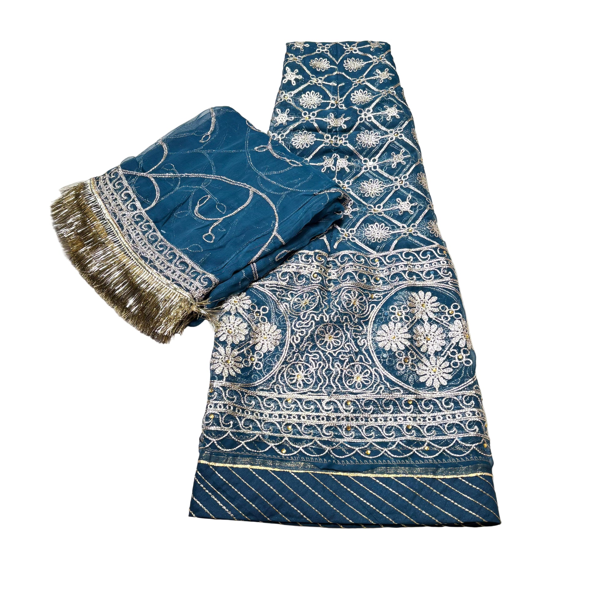 Blue fabric with white patterns and fringes on a light gray background