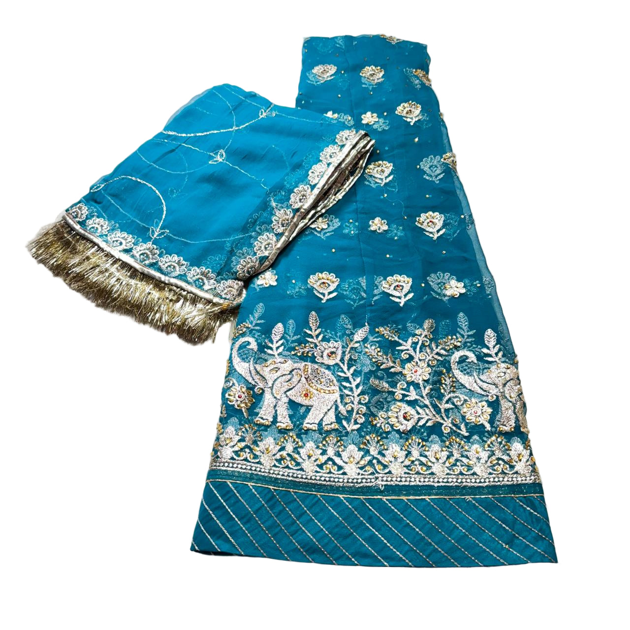Blue embroidered fabric with floral and elephant designs on a light gray surface
