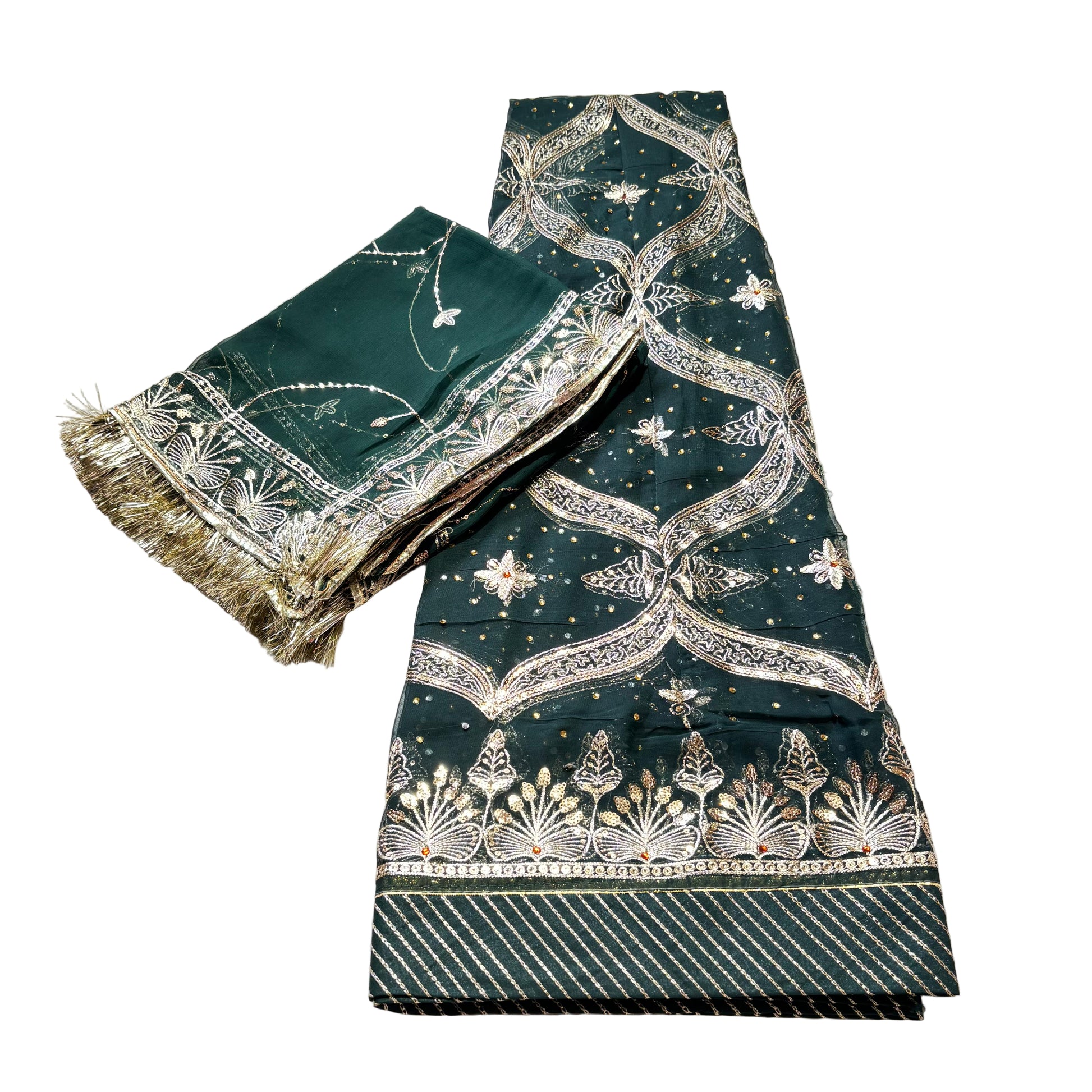 Green fabric with white floral patterns on a beige surface