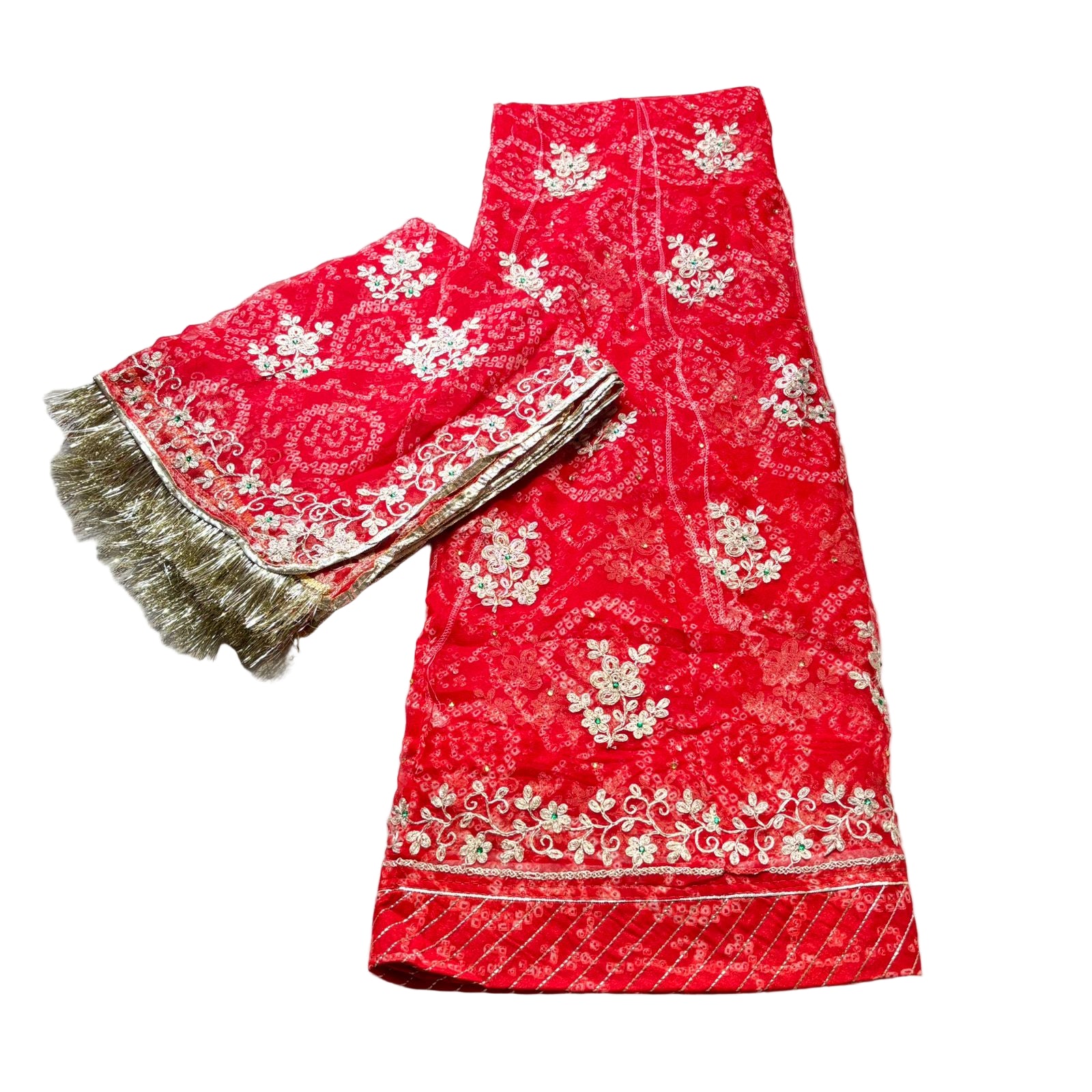Red fabric with white floral patterns on a white background