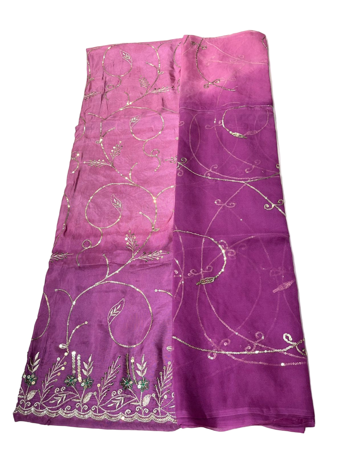 Purple fabric with silver embroidery on a light gray background