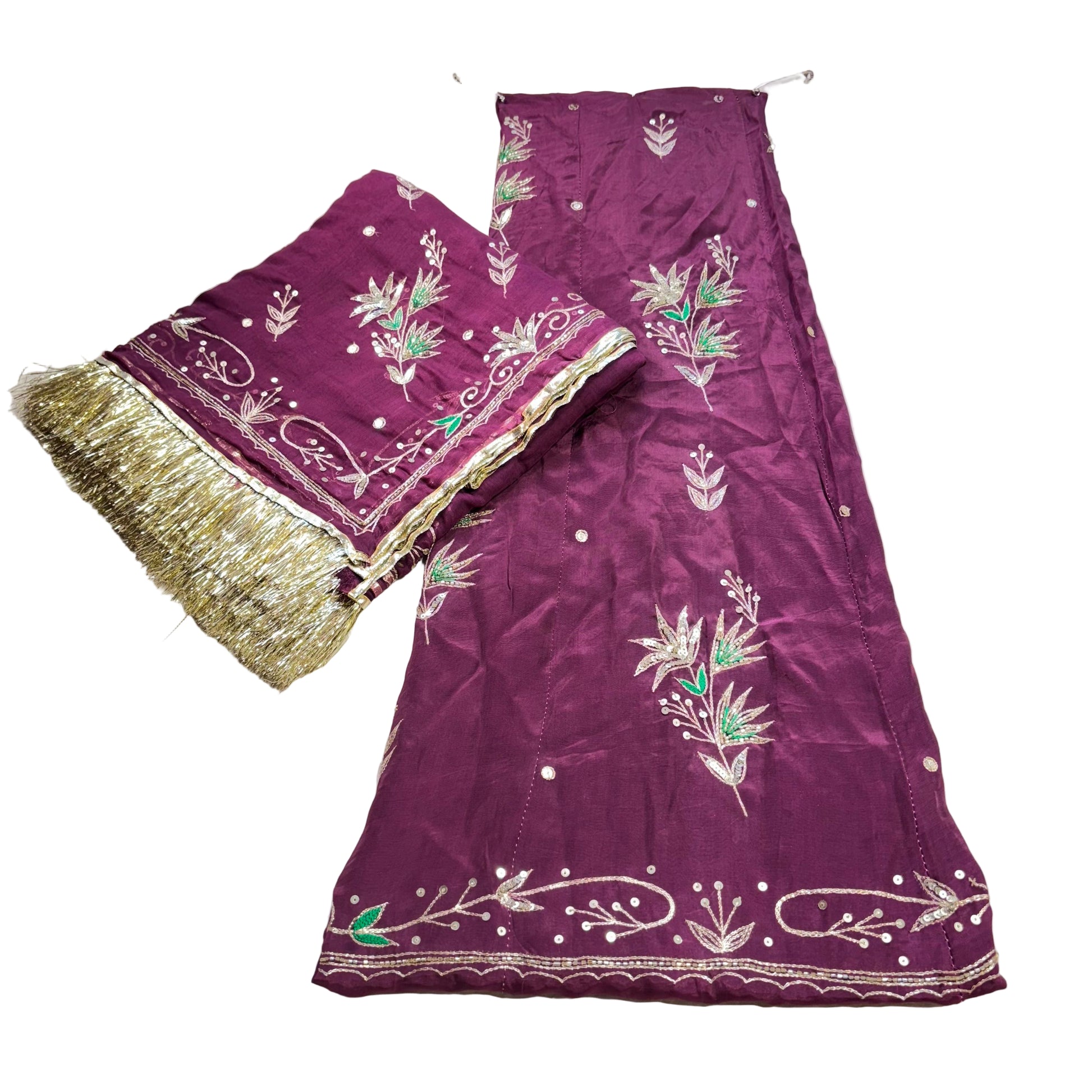 Purple embroidered fabric with gold border on a light background