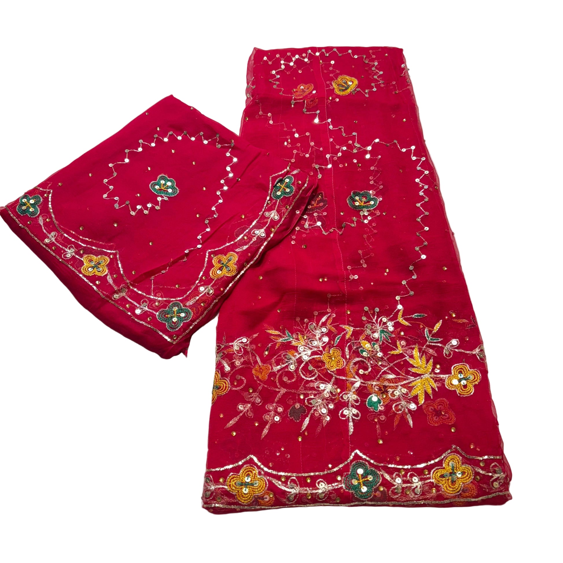 Red embroidered fabric with floral patterns on a white background