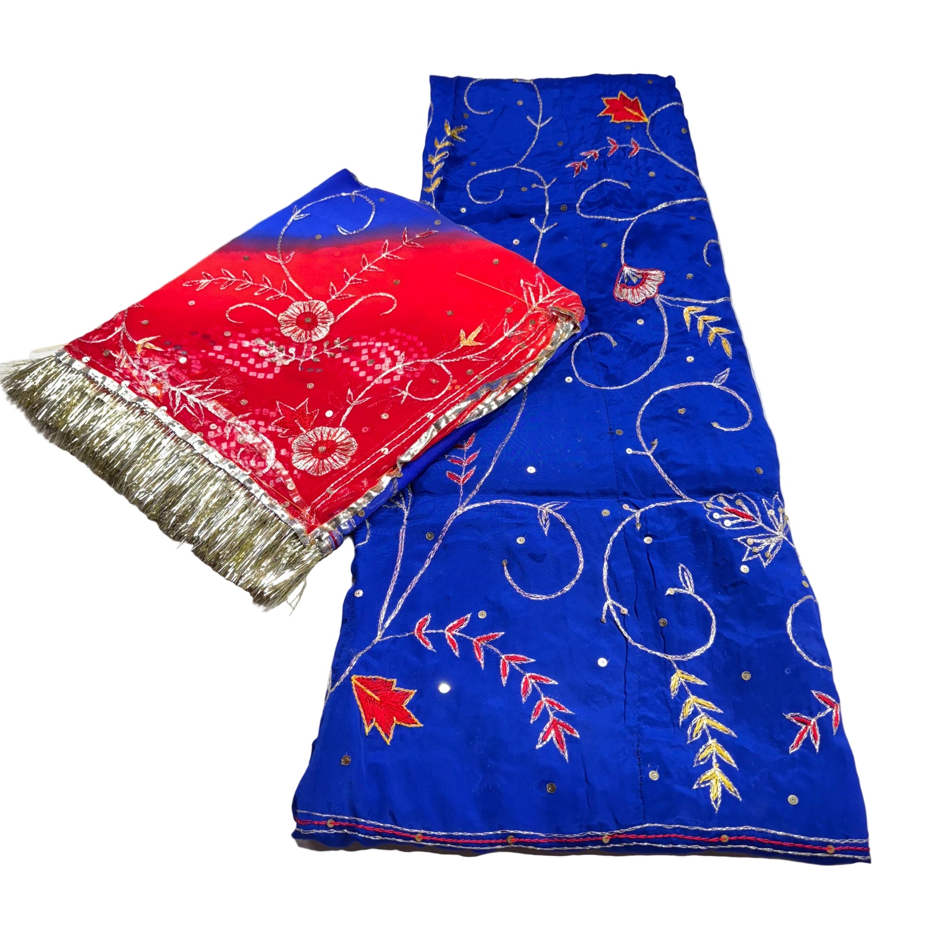 Blue fabric with white and red patterns on a white background
