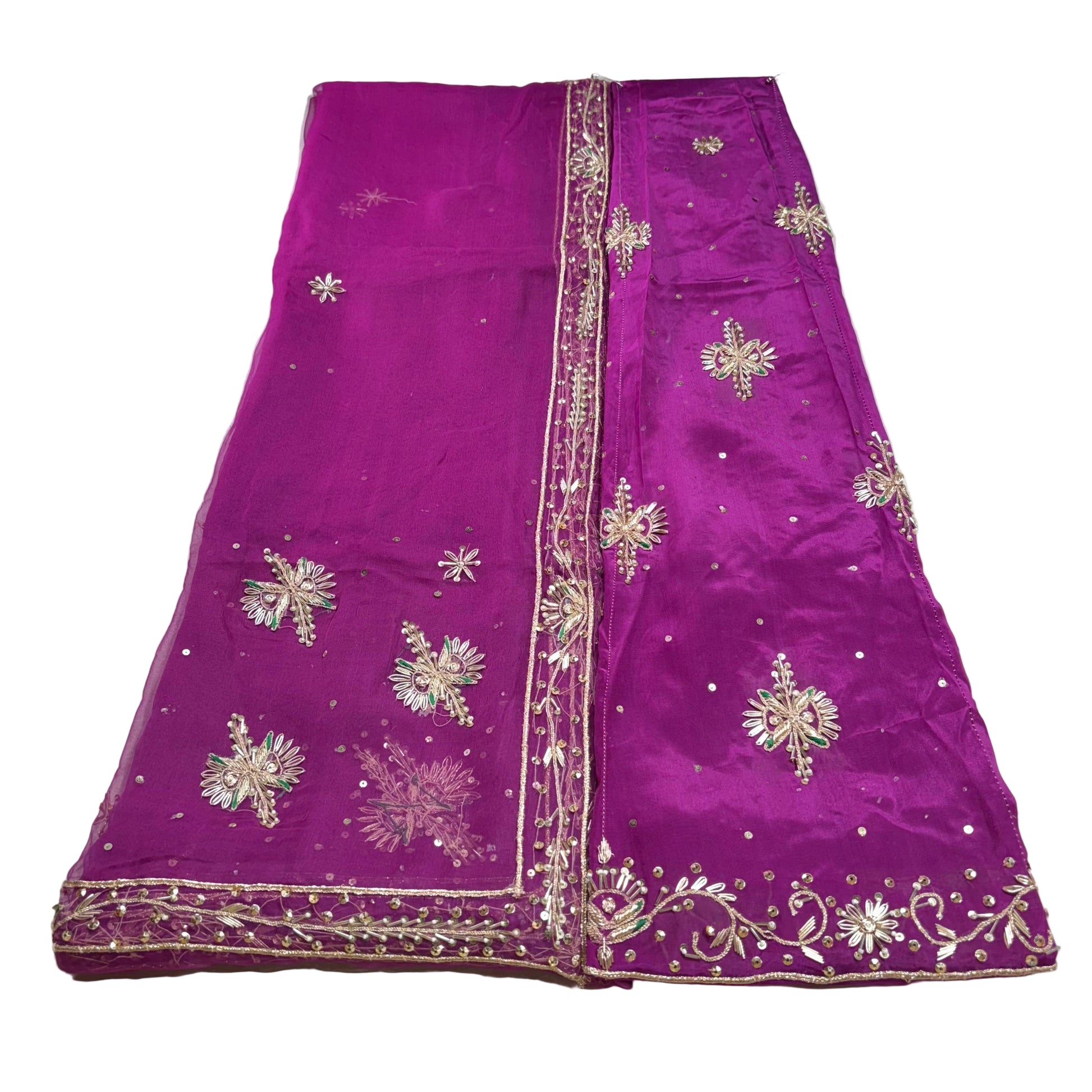 Purple saree with gold embroidery on a white background