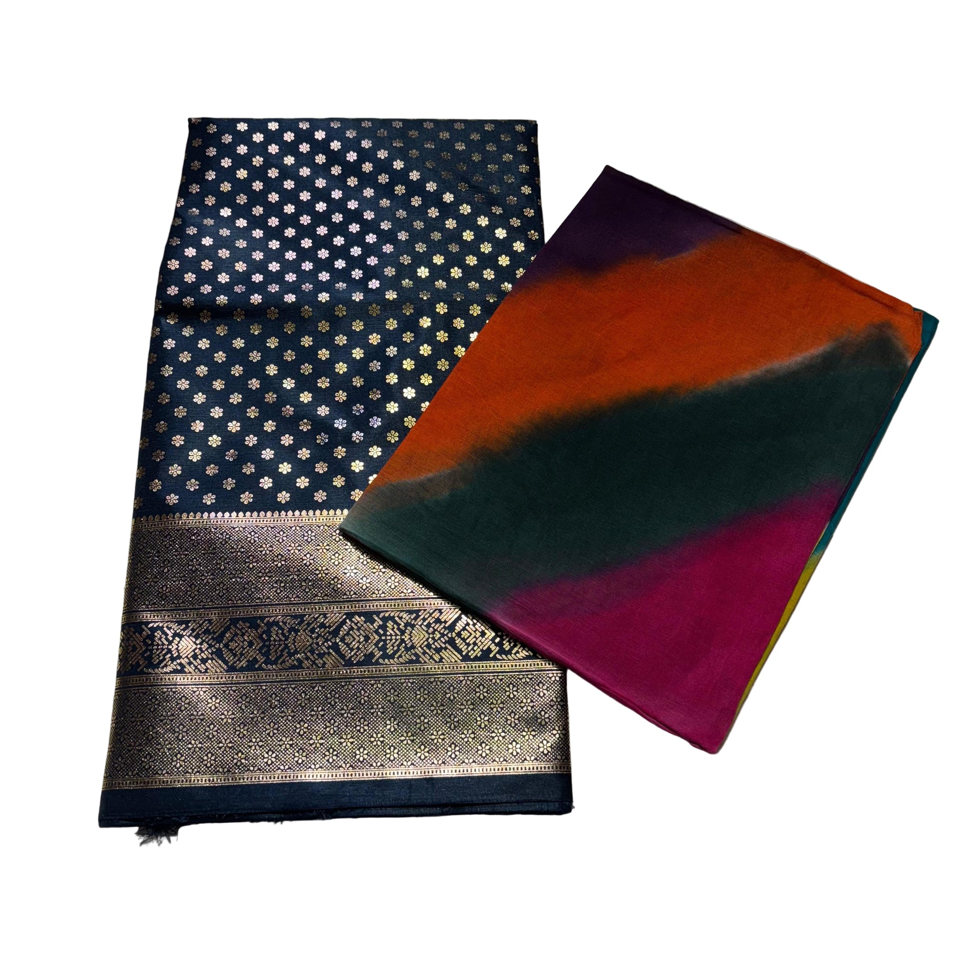 Two sarees on a light gray surface, one with a blue and gold pattern and the other with multicolor design.