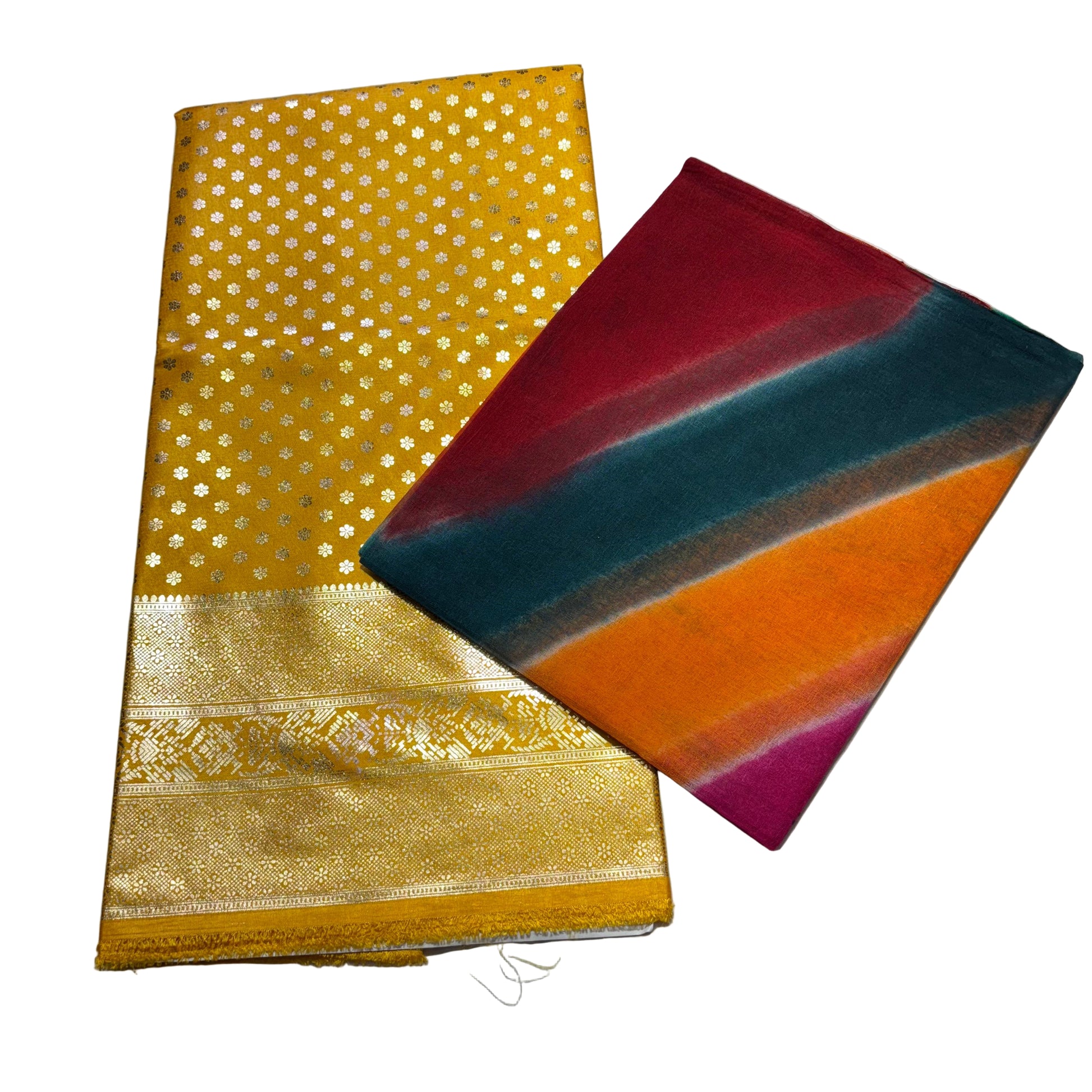 Gold fabric with geometric pattern and multicolored fabric on a white background