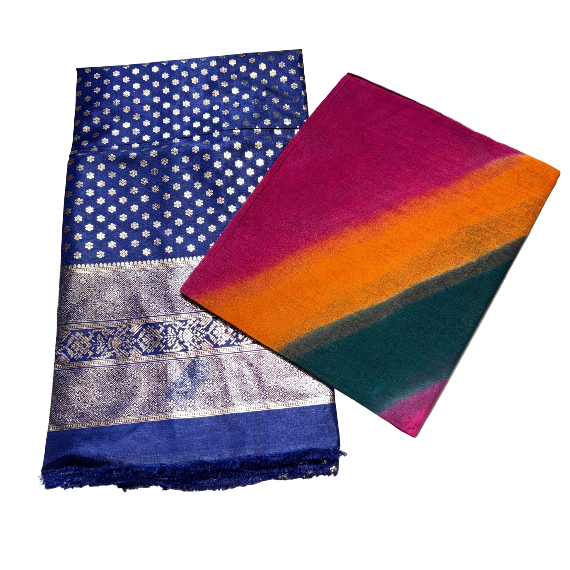 Two scarves, one blue with white patterns and the other multicolored, on a light gray background.