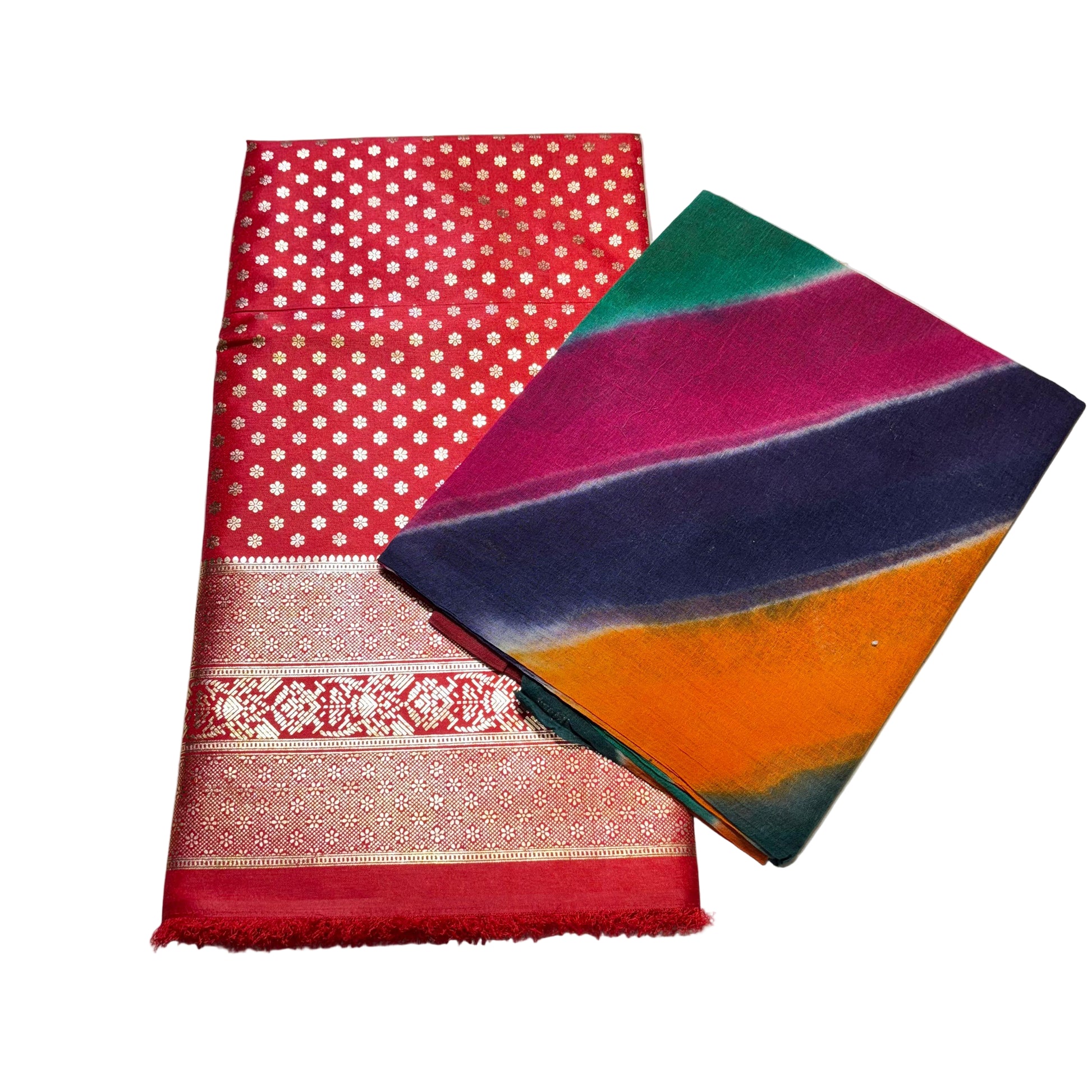 Red fabric with white patterns and a colorful folded fabric on a light background