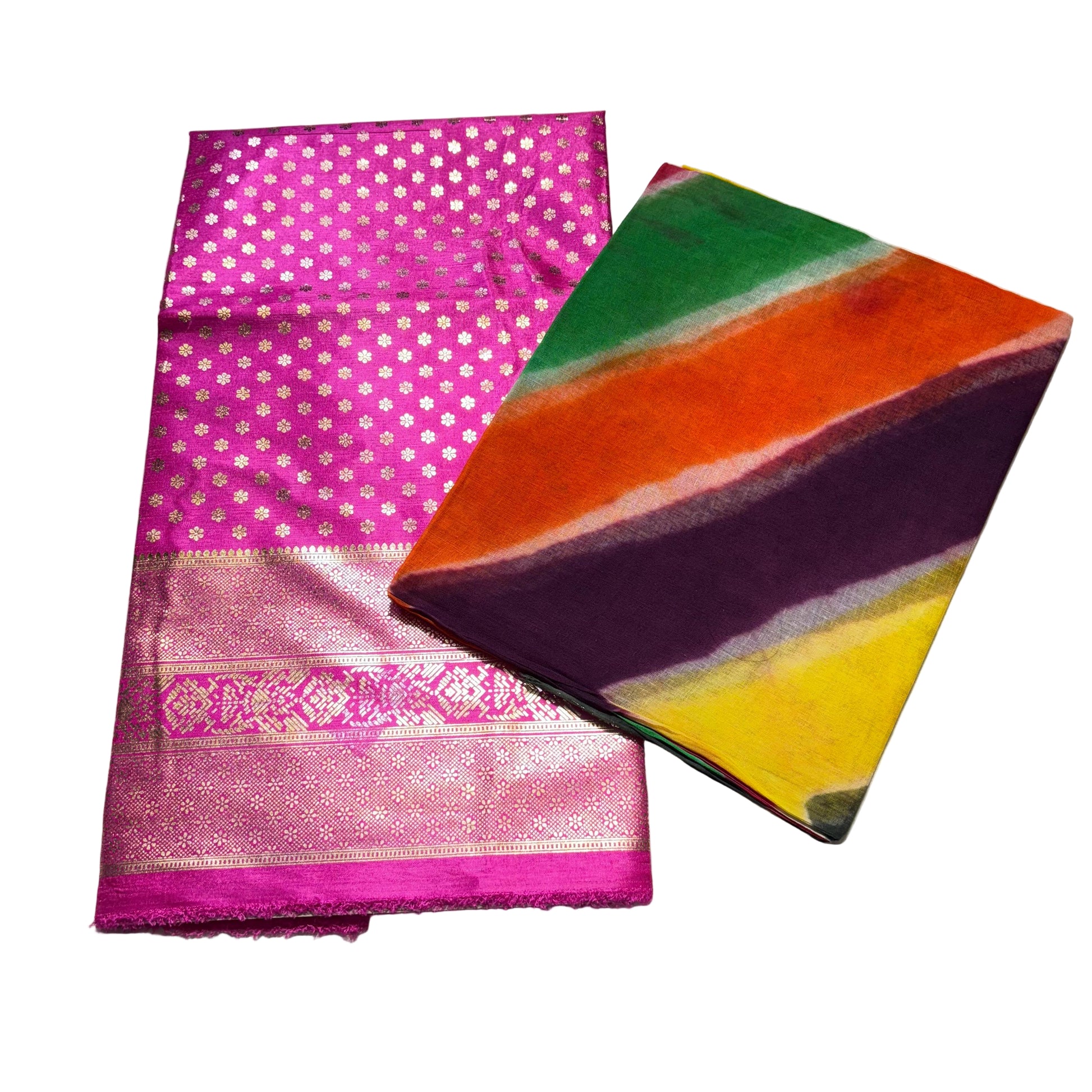 Pink saree with gold patterns and colorful folded fabric on a white background