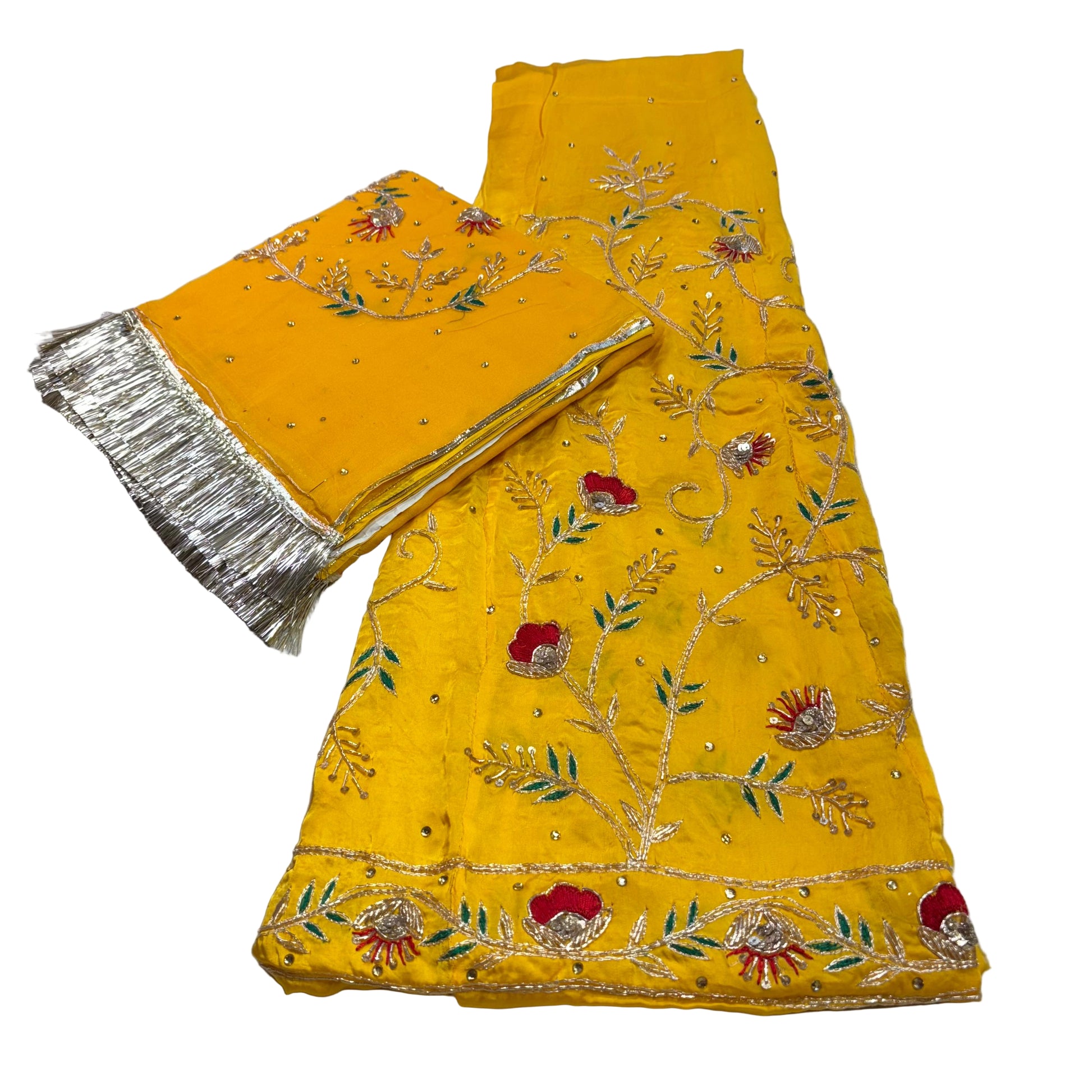 Yellow fabric with floral embroidery and silver border on a white background