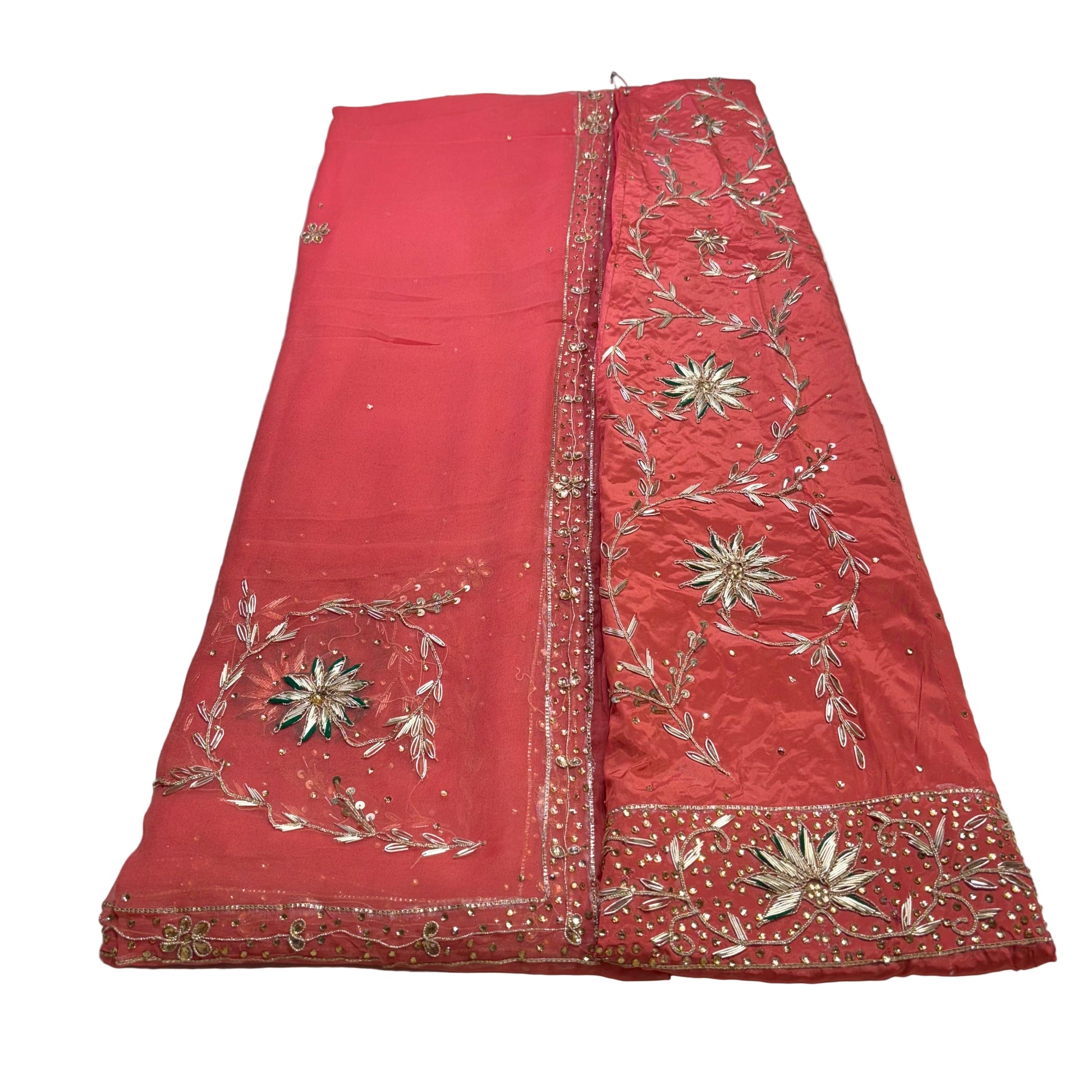 Red embroidered fabric on a white background