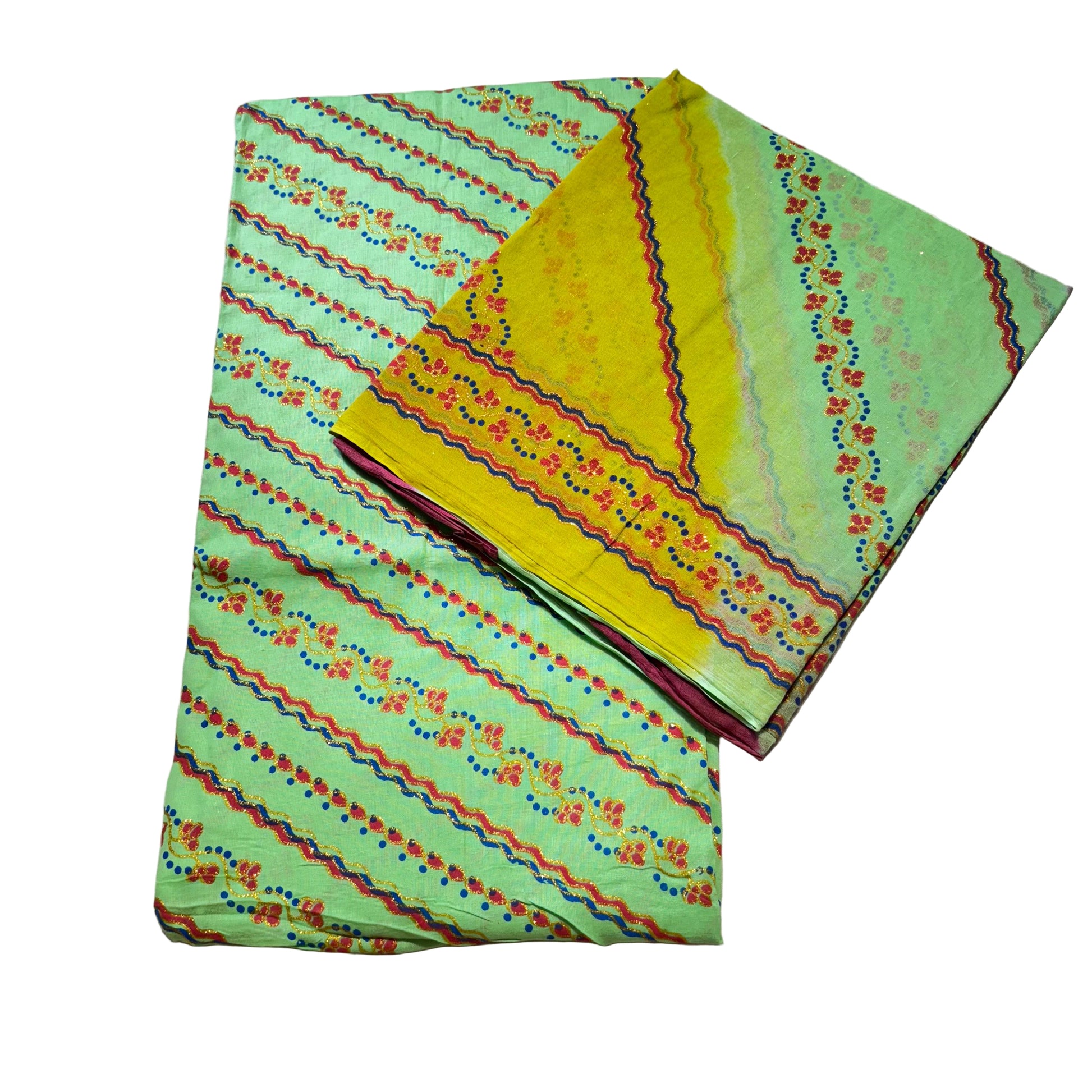 Colorful fabric with green, yellow, and red patterns on a textured surface