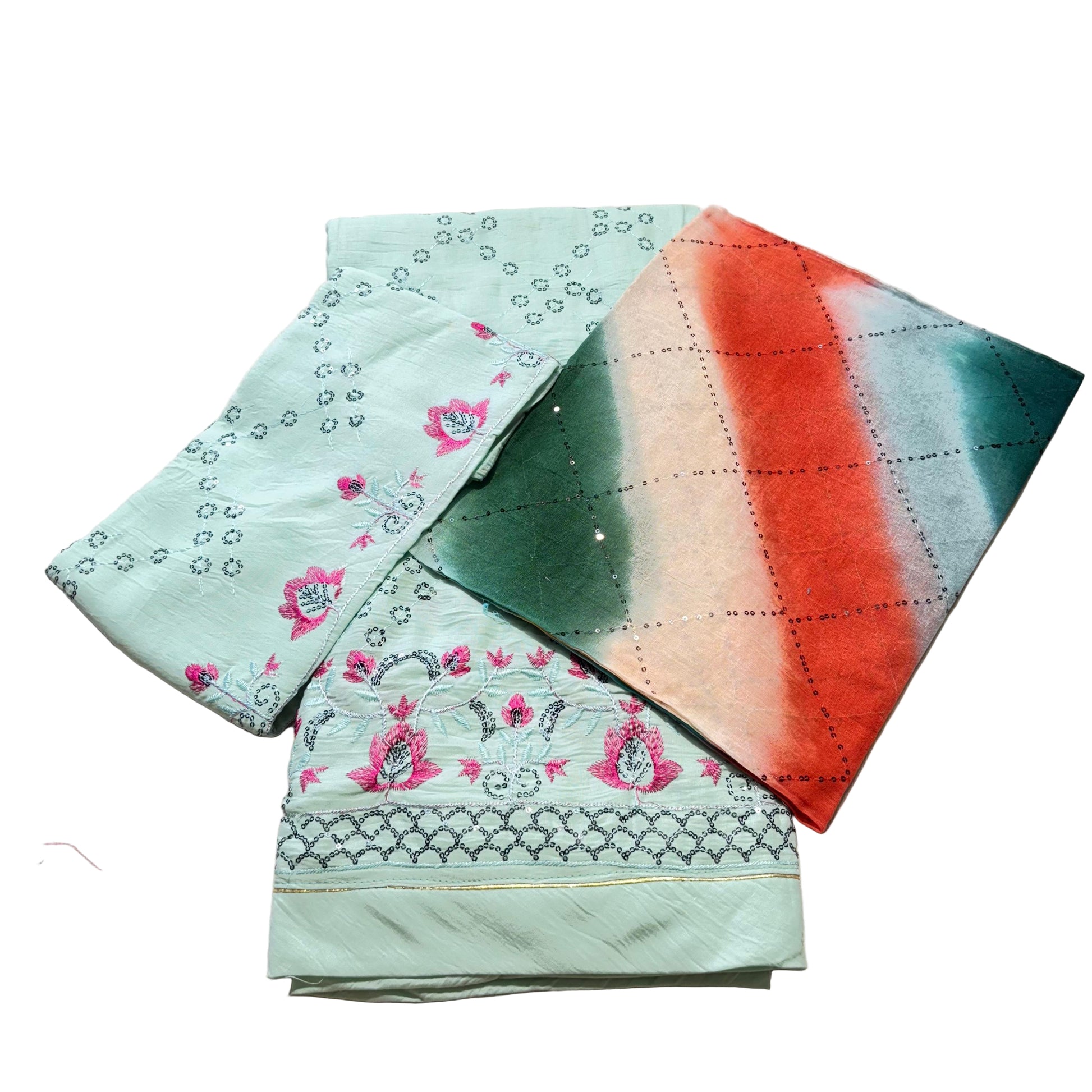 Two fabric samples on a light-colored surface, one with floral pattern and the other with solid color.