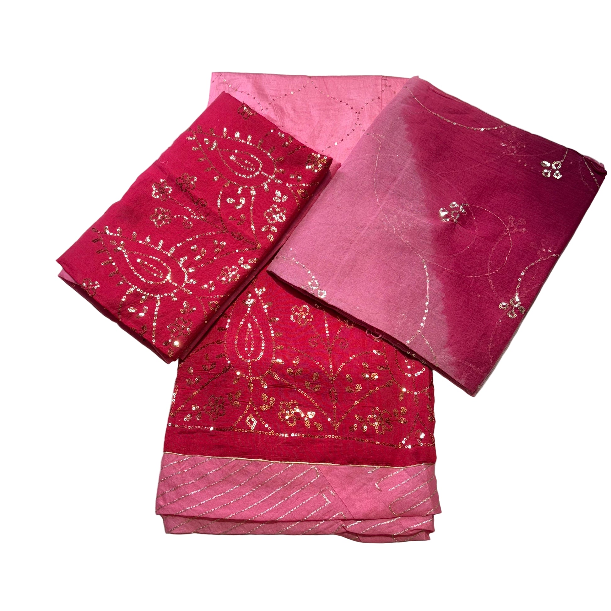 Pink fabric with gold patterns on a light gray background