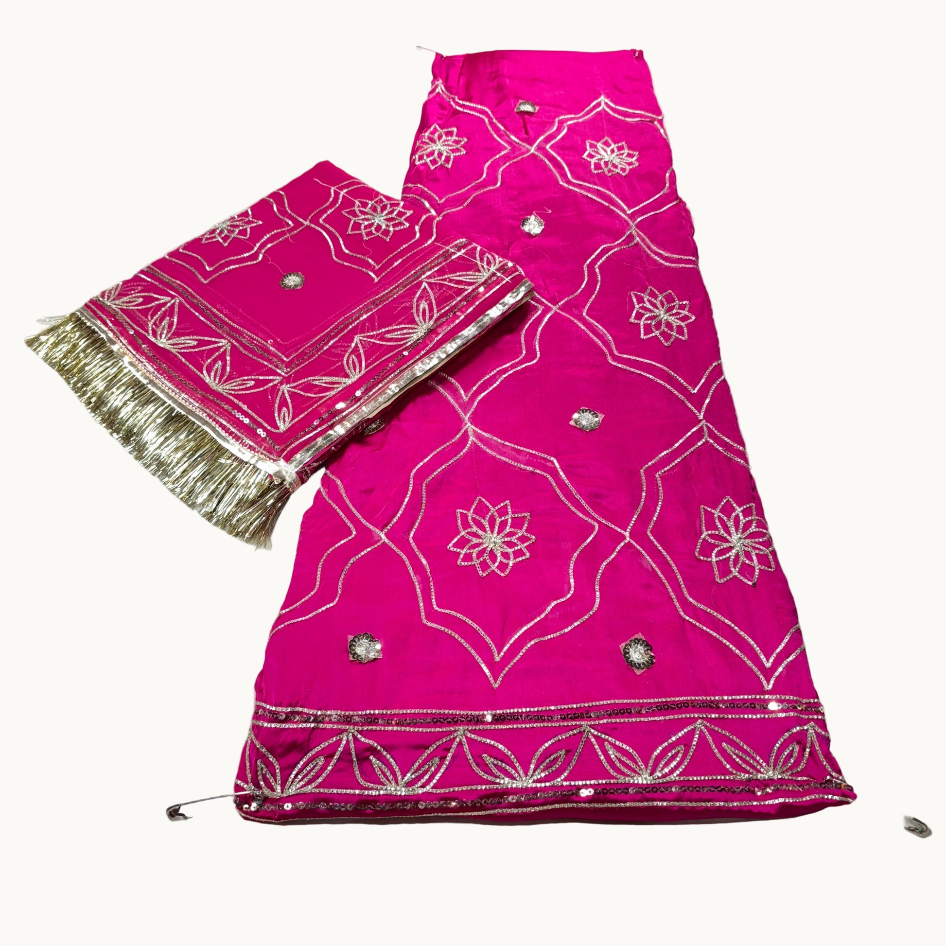 Pink traditional outfit with white patterns on a white background
