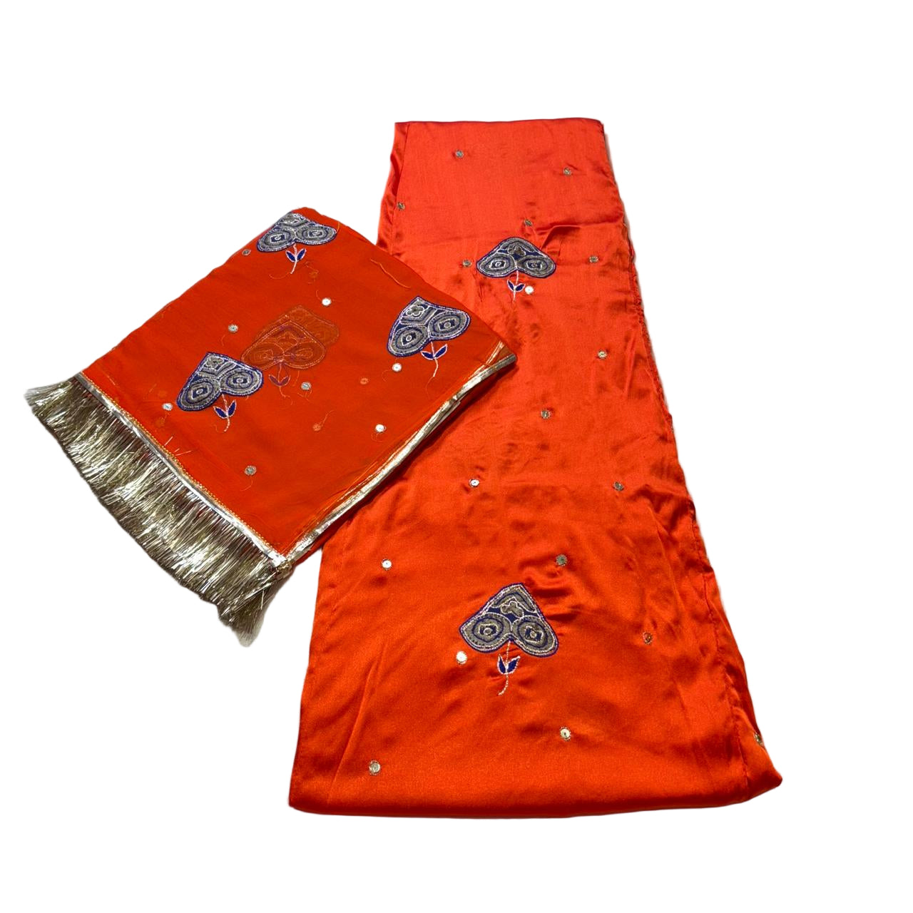 Orange fabric with silver embroidery on a white background
