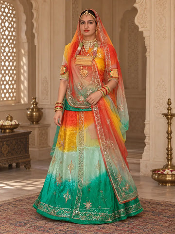 Orange green Rajputi poshak in pure natural crepe shaded through yellow and mint, zardozi star buttis and orange odhni, full front view
