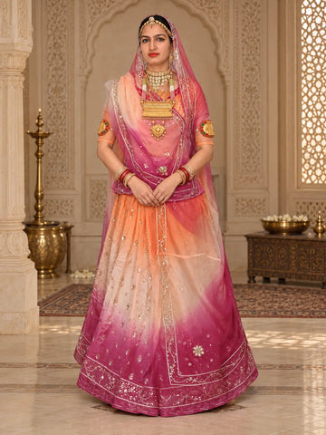 Orange pink Rajputi poshak in pure natural crepe shaded peach to rani pink, zardozi leaf buttis and odhni, full front view