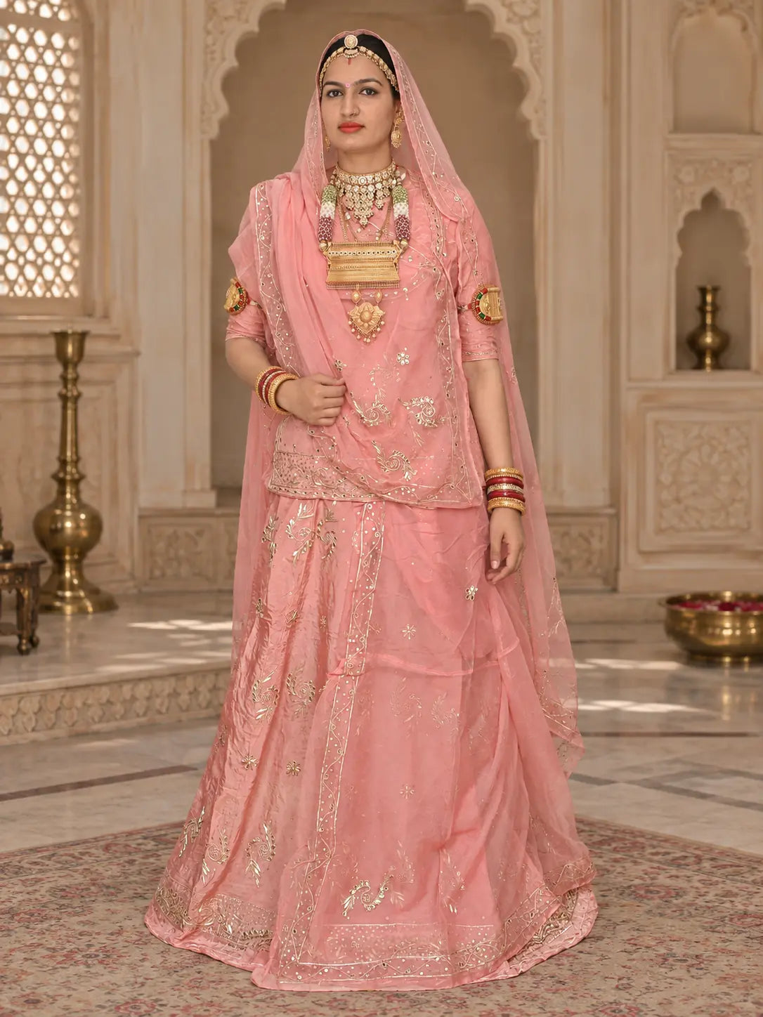 Peach colour Rajputi poshak in pure natural crepe with zardozi vine buttis and matching odhni, full front view