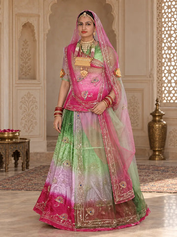 Rani pink green Rajputi poshak in pure natural crepe with zardozi fan buttis and pink odhni, full front view