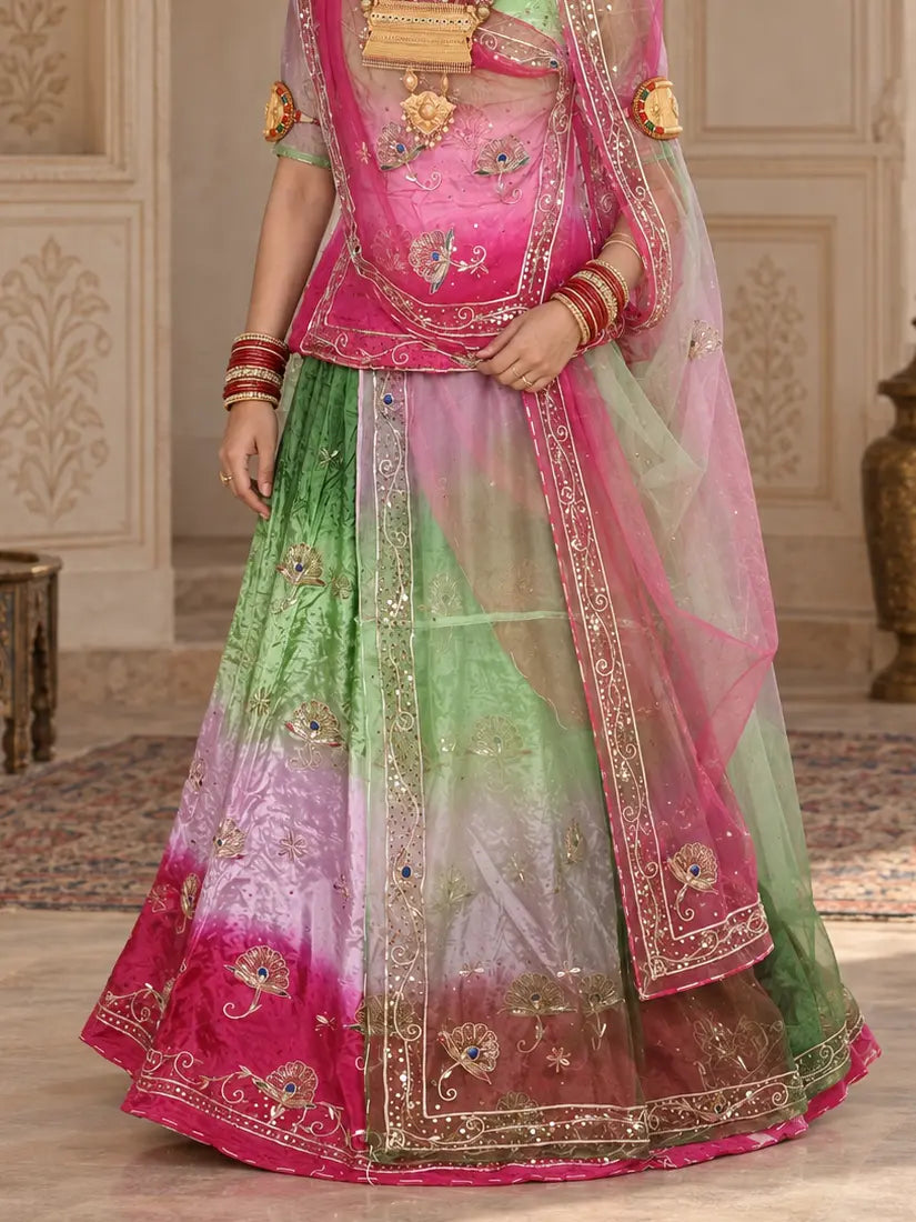 Lehenga close-up shaded light green, light pink and rani pink, zardozi buttis with blue stones and bel hem border