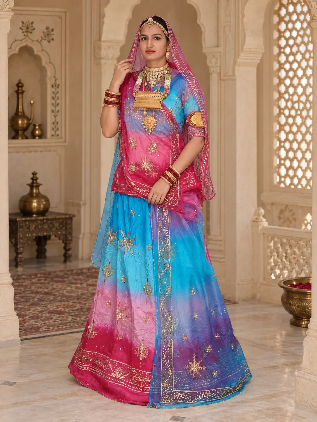 Sky blue colour Rajputi poshak shaded to rani pink in pure natural crepe, zardozi star buttis and pink odhni, full front view