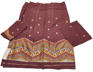 Maroon traditional outfit with geometric patterns on a white background