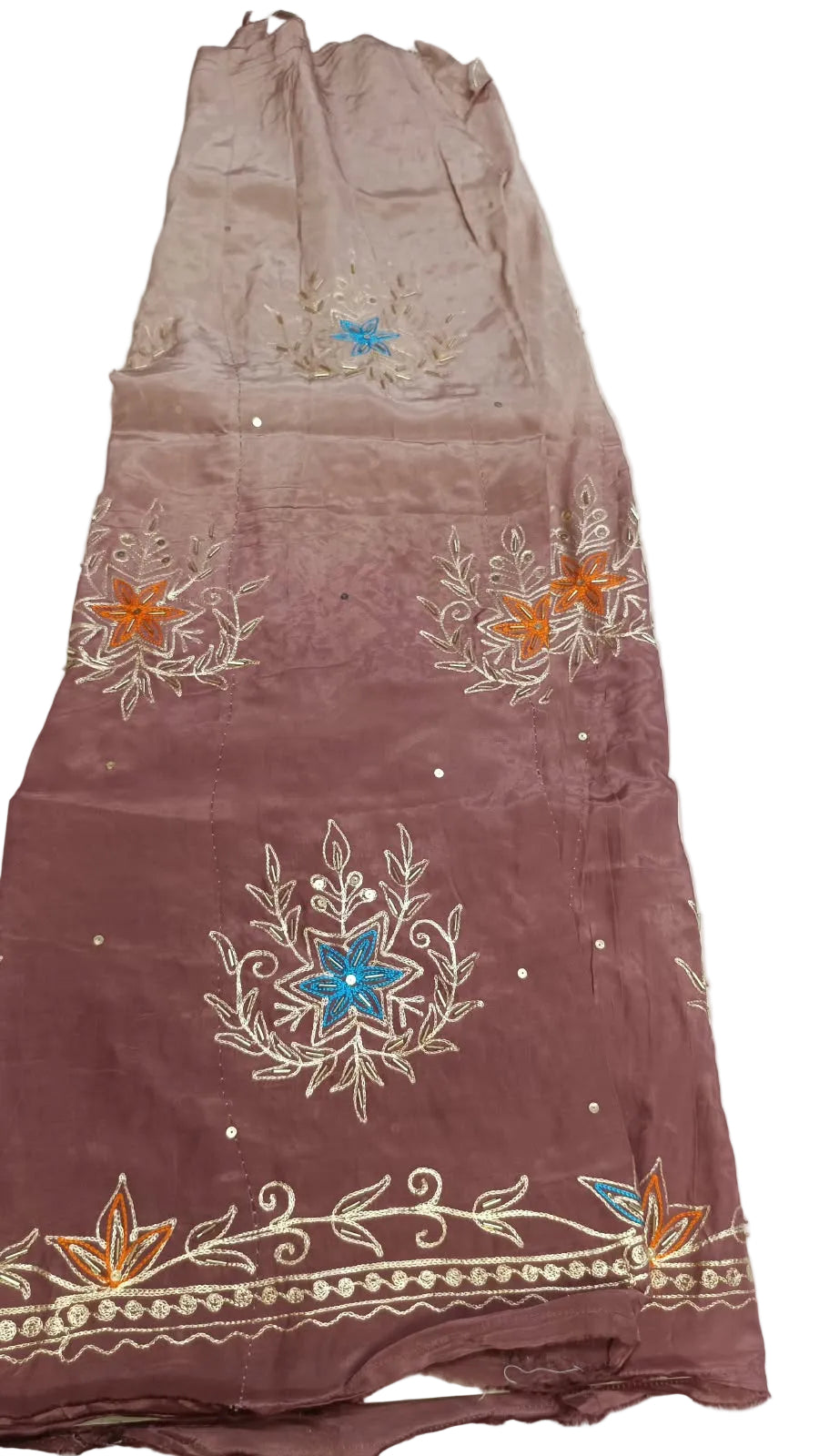 Onion colour rajputi poshak fabric shading from pale to deep onion pink, with zari cutdana bootas and a lotus zari border