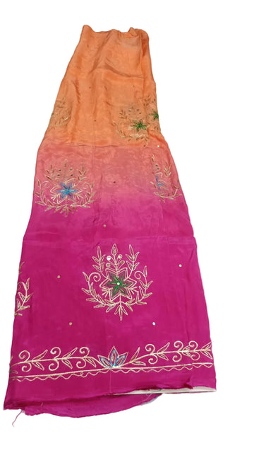 Orange and pink rajputi poshak fabric shaded from gajri orange to rani pink, with zari cutdana bootas and a turquoise lotus zari border