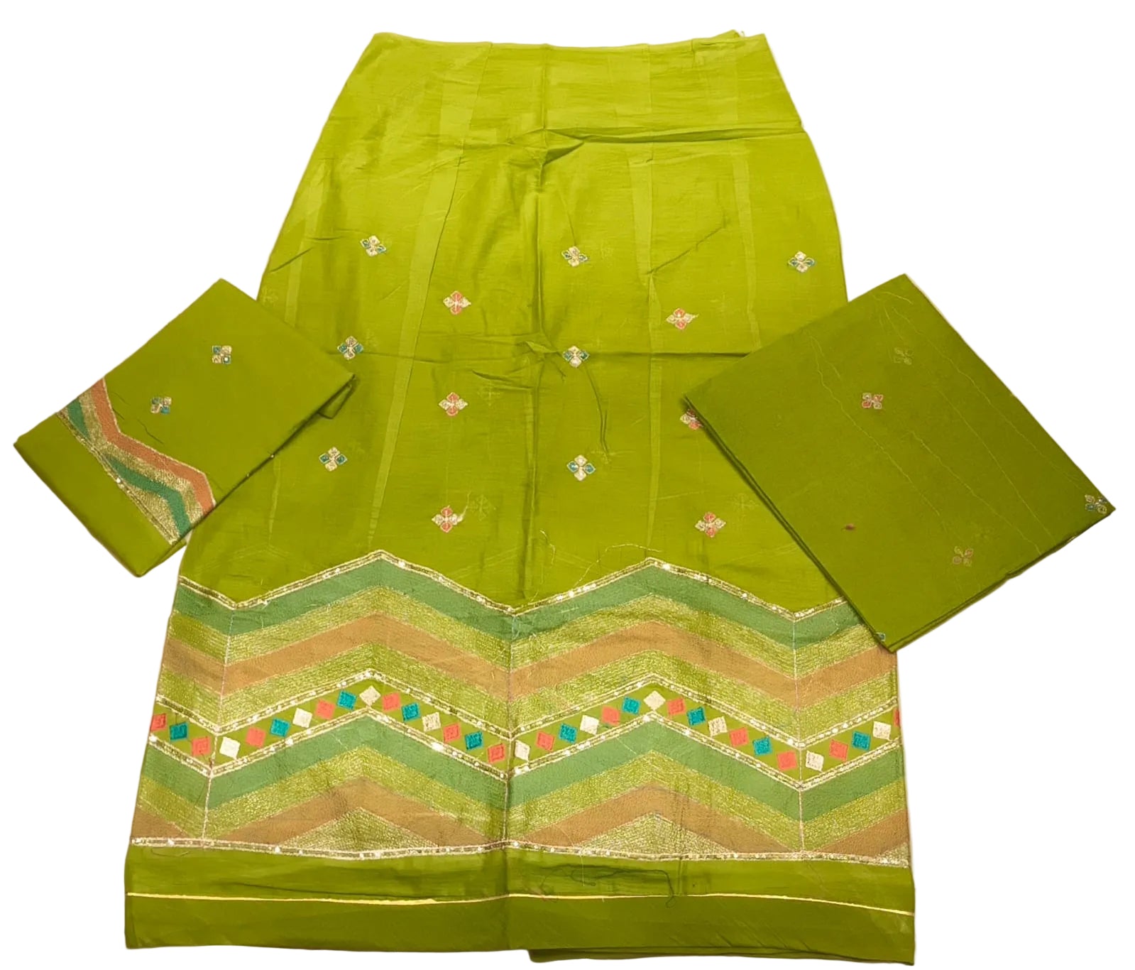 Green traditional outfit with embroidered patterns on a white background