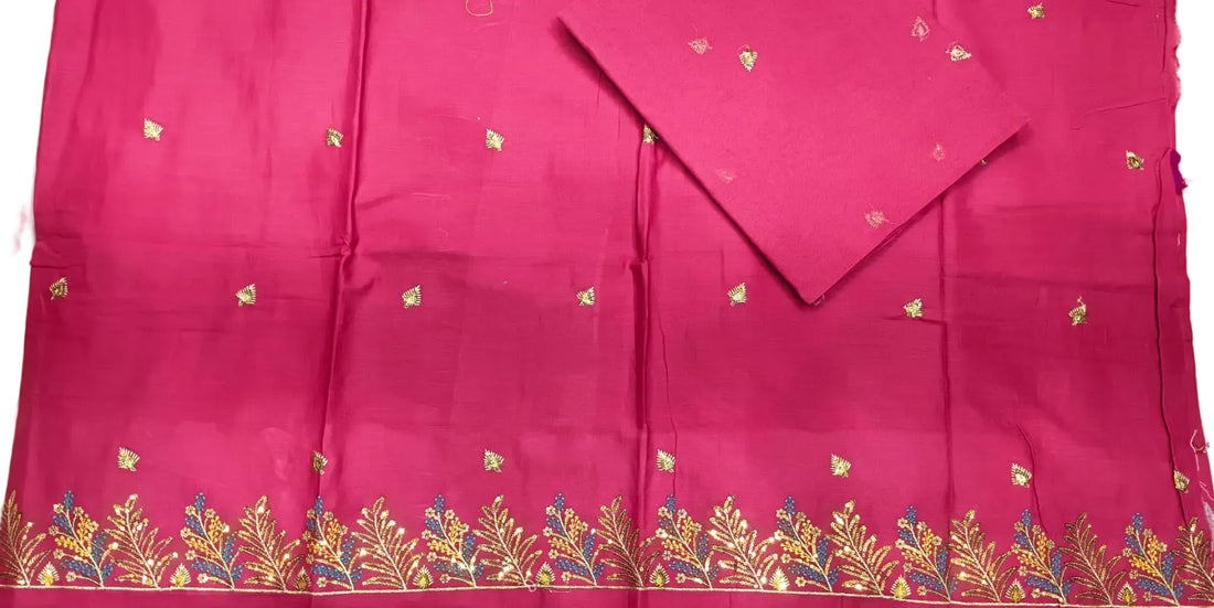 Red fabric with gold embroidery on a white background