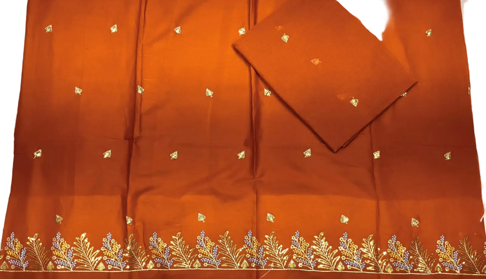 Brown fabric with floral patterns on a white background