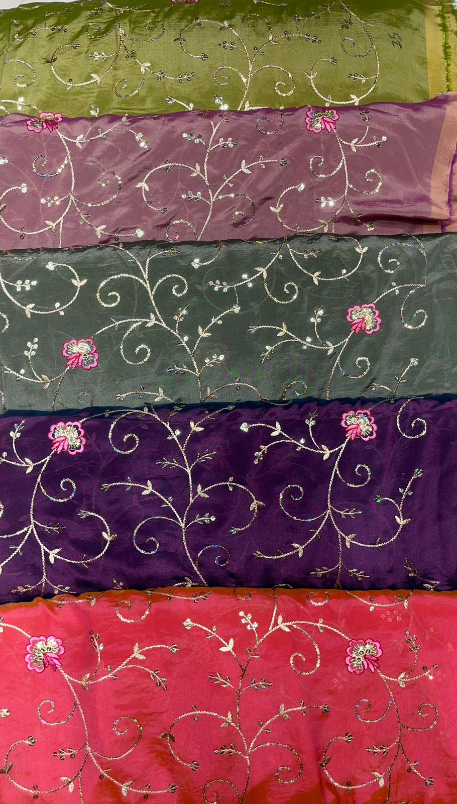 Stack of colorful fabric with floral patterns