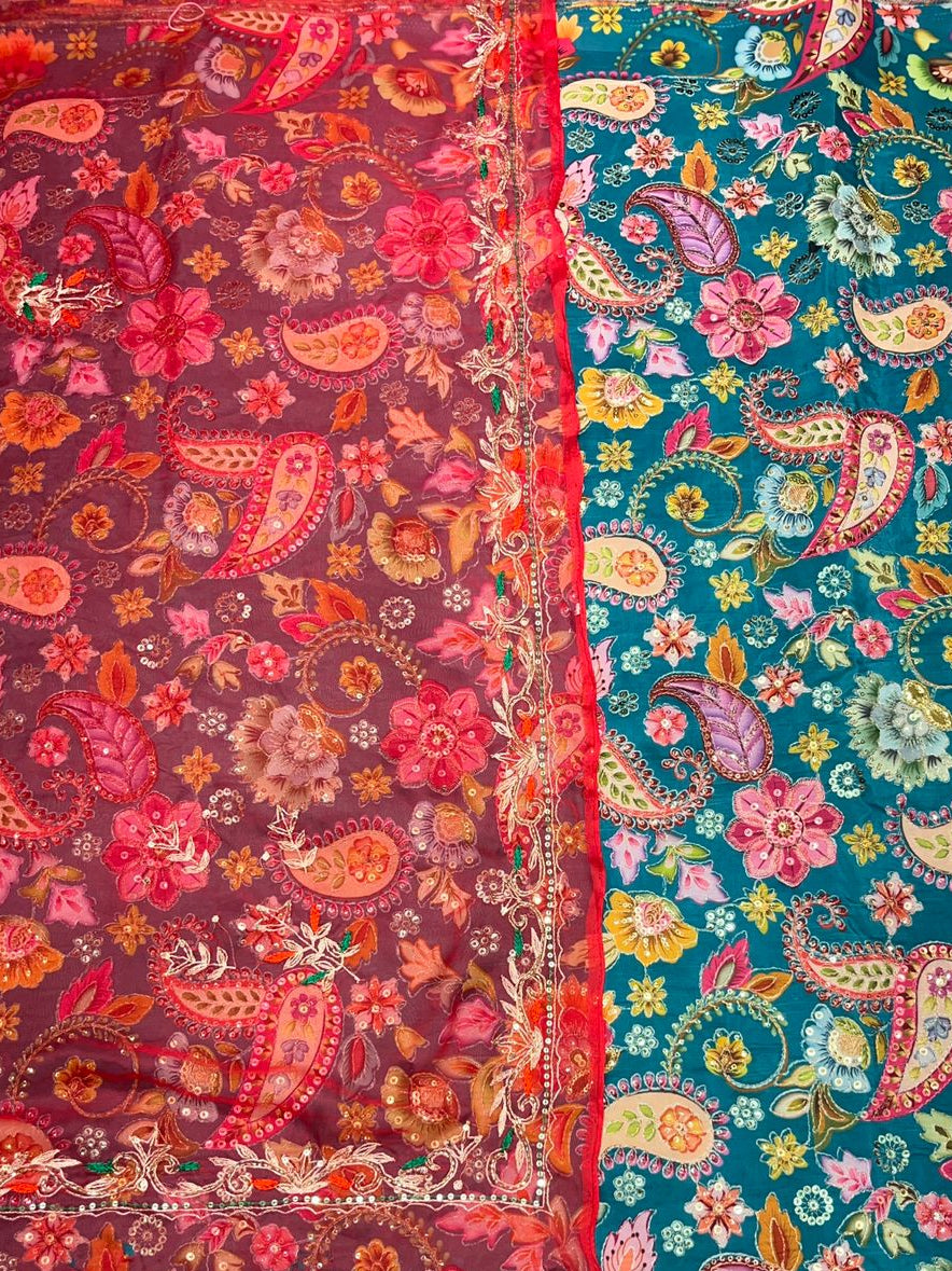 Two colorful fabric swatches with floral and paisley patterns.