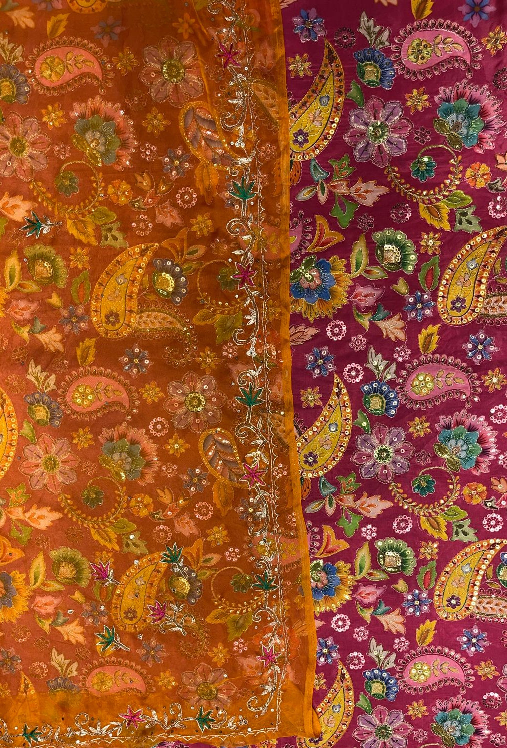 Two colorful fabric swatches with intricate paisley patterns on a plain background.