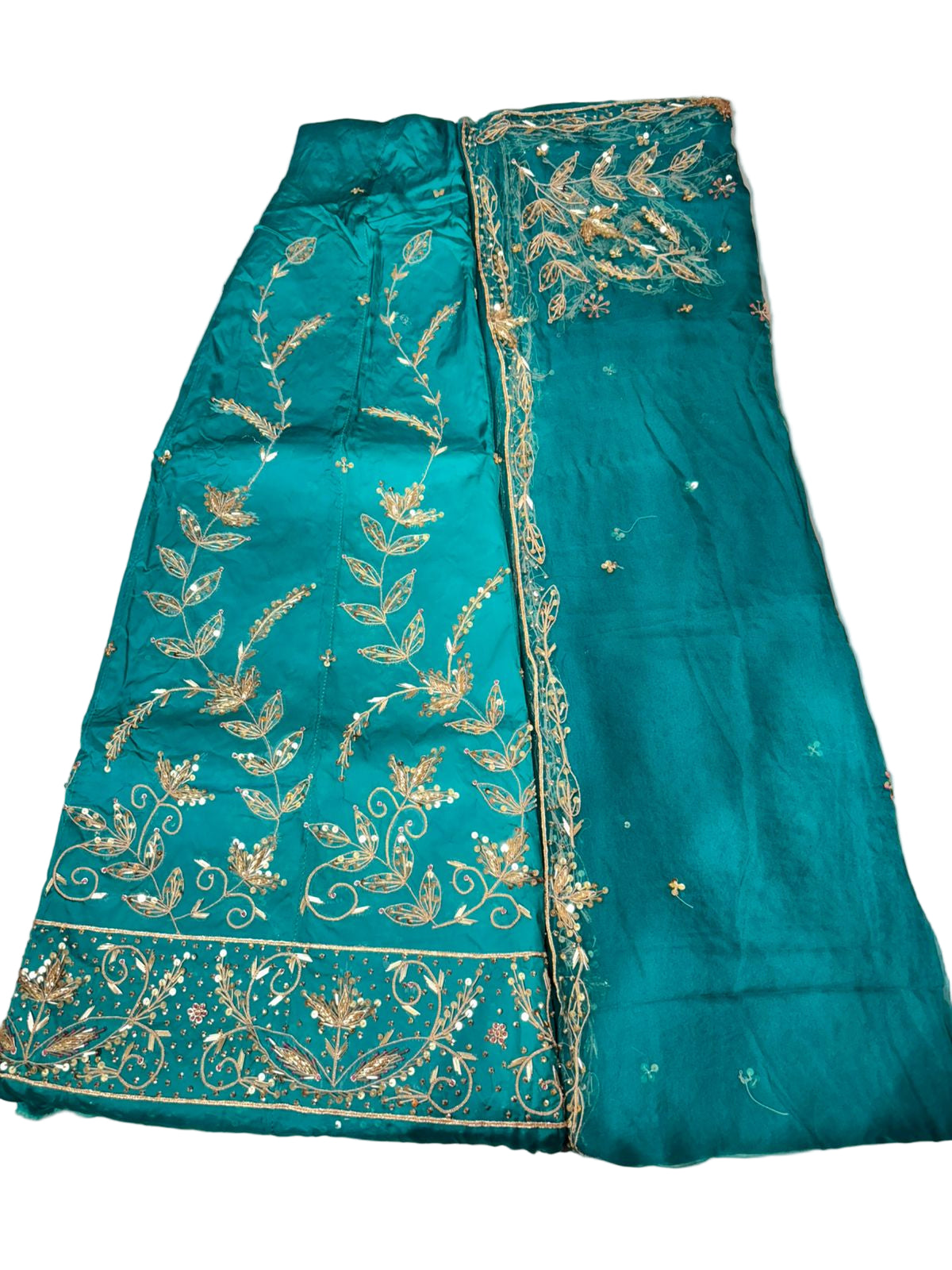 Teal saree with gold embroidery on a white surface