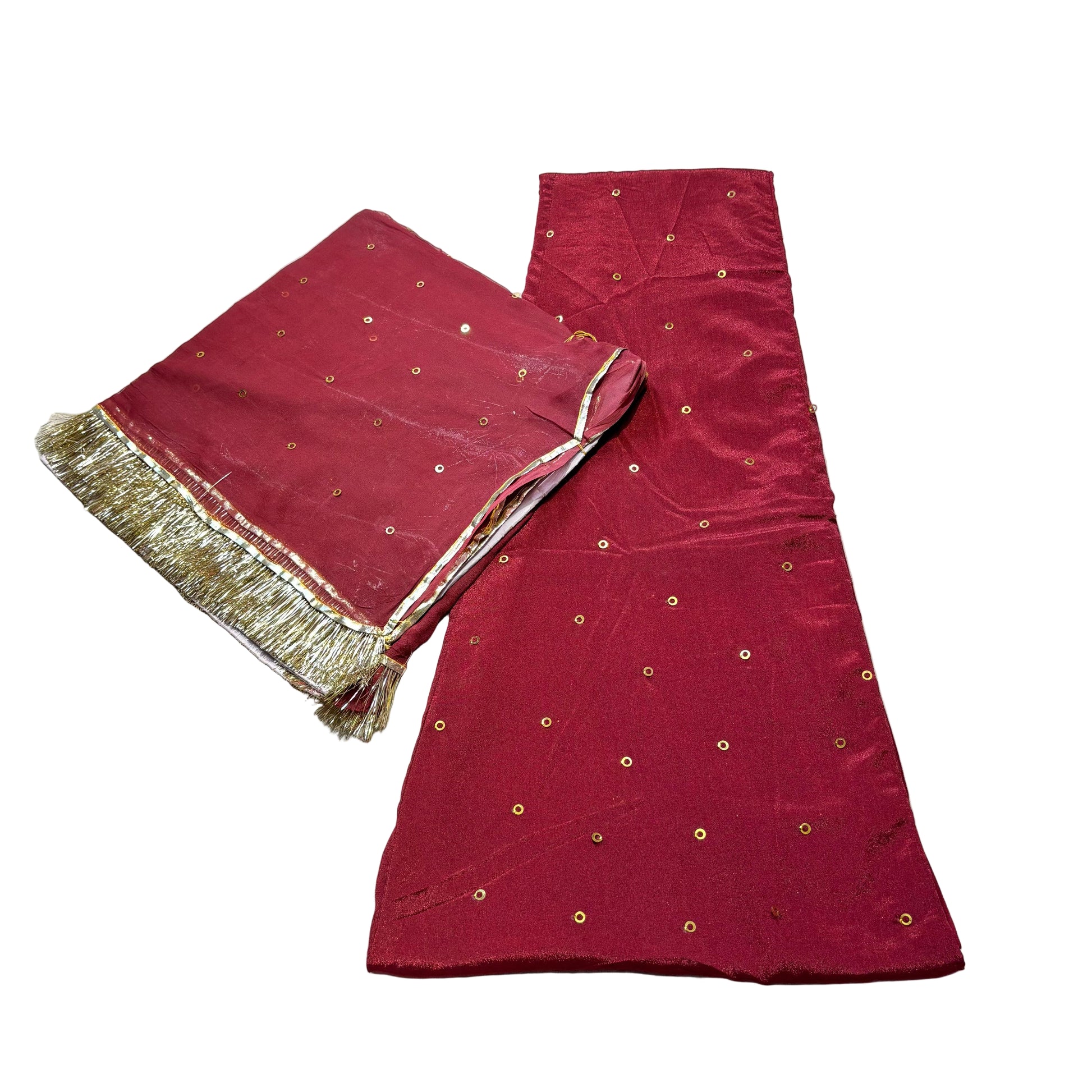 Red fabric with gold embroidery on a light gray background